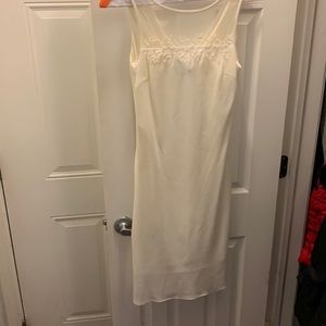 Karin Stevens evening collection, size 8 cream in color mid length.